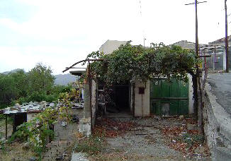 This former coffee shop in the centre of the village Dierona is in need of renovation. 