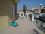 There is plenty of room at the front of the house for the childern to play.